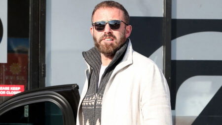 Ben Affleck standing in front of a fastfood in Beverly Hills after giving daughter Fin driving lessons.