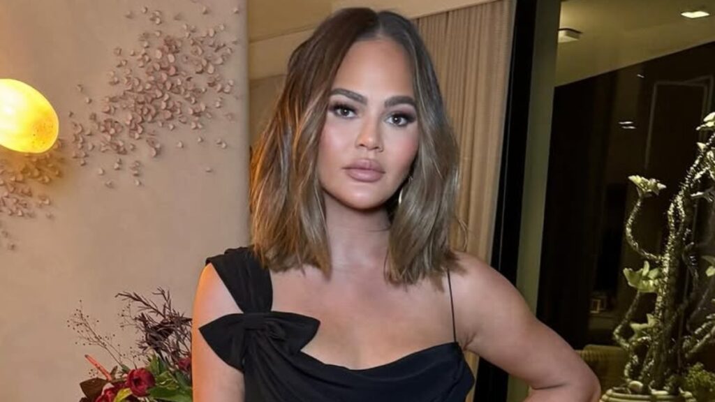 Cookbook author and model Chrissy Teigen in a black dress.