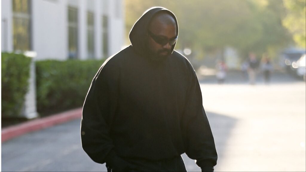 Kanye West arrives at his son's basketball game