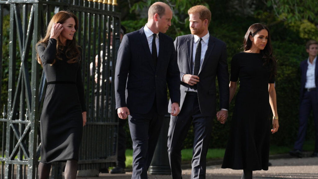 he Prince and Princess of Wales along with Prince Harry and Meghan Markle the Duke and Duchess of Sussex view the tributes left after the Death of Queen Elizabeth II, at Windsor Castle.