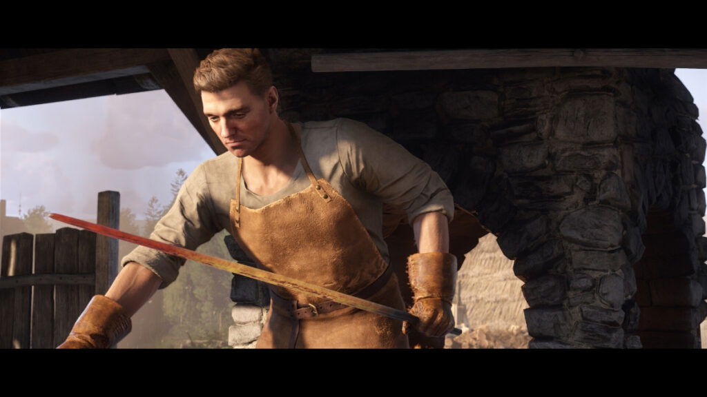 A blacksmith works a sword in the forge in Kingdom Come: Deliverance 2, one of the most anticipated game releases of February 2025