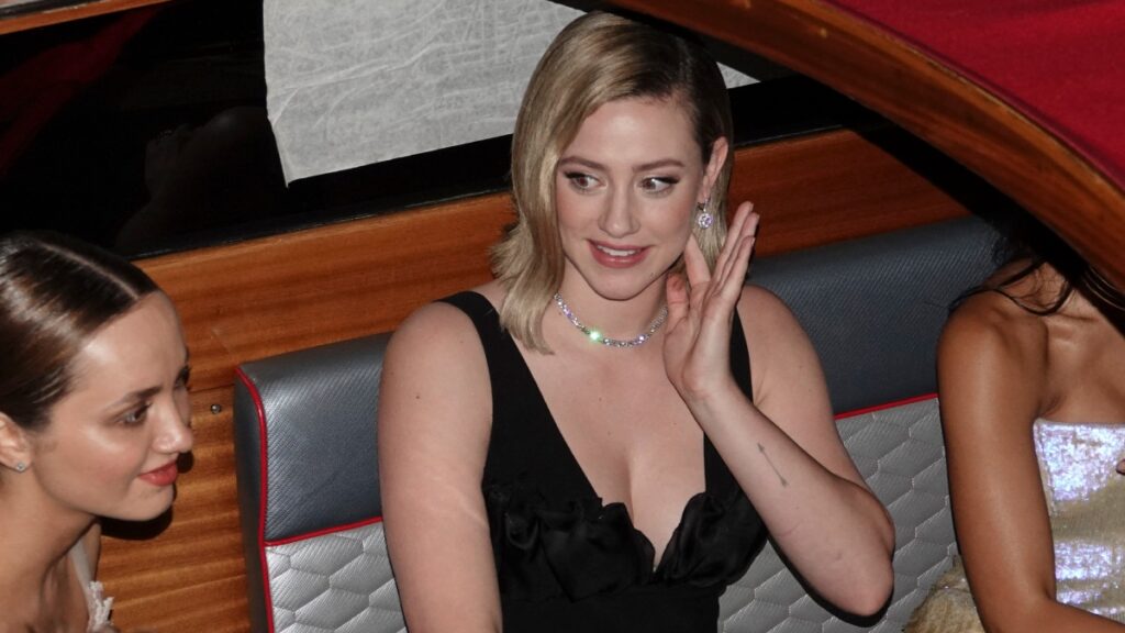 Lili Reinhart attends an event on on Giorgio Armani's yacht in Venice.