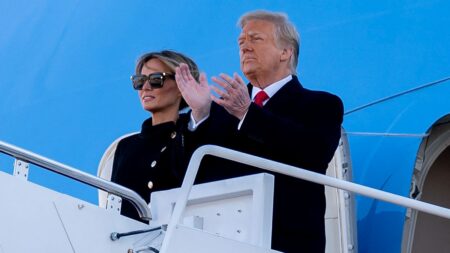 Donald Trump and Melania Trump arrive to a farewell ceremony at Joint Base Andrews, Maryland, U.S