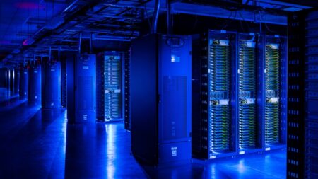 A blue-lit cold storage room for Meta servers