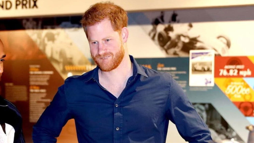 Prince Harry, the Duke of Sussex in a blue shirt.