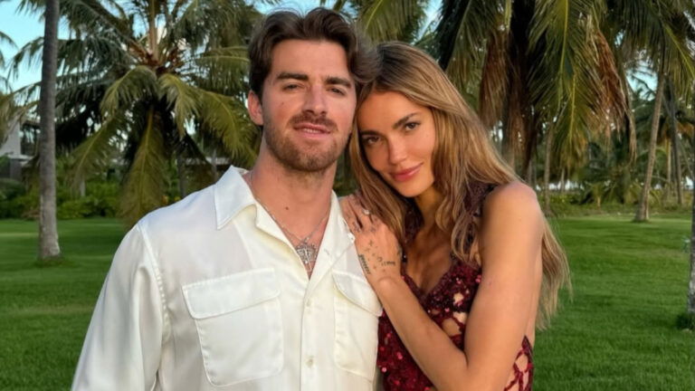 Drew Taggart of The Chainsmokers poses with fiancée Mari Fonsec, with Mari leaning against his shoulder