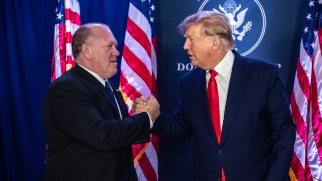 Tol Homan, Donald Trump's new Border Czaar and former Border911 CEO, clasps the president's hand