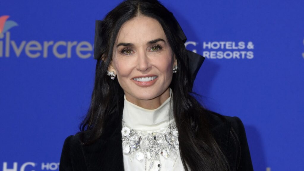 Demi Moore smiles at an event