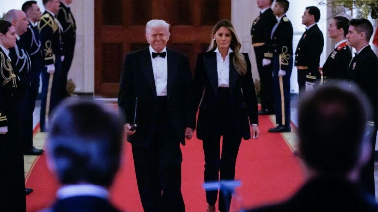 President Donald Trump and first lady Melania Trump arrive for the National Governors Association Dinner in the East Room of the White House in Washington, DC on February 22, 2025