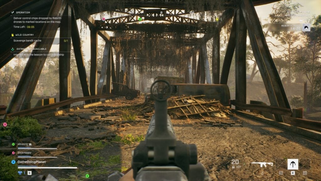 The player aims down the sights of their assault rifle on a bridge in Exoborne