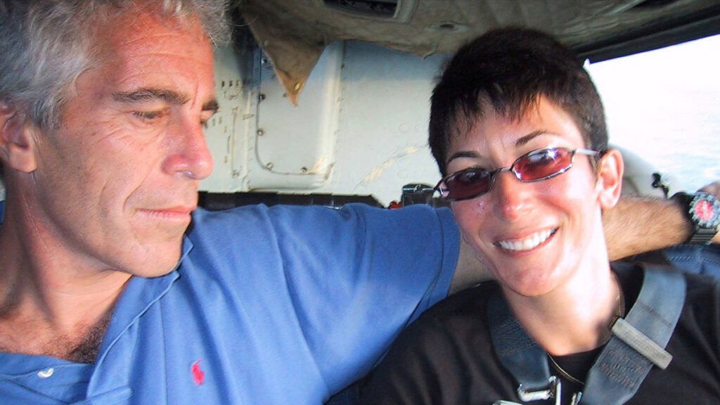 Jeffrey Epstein and Ghislaine Maxwell seen in an undated photo flying around on a helicopter together. 