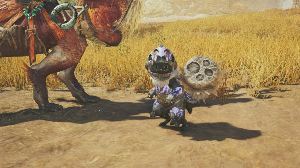 An adorable Palico stands beside a Seikret in Monster Hunter Wilds