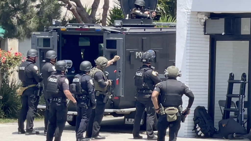 Police and Swat outside of the American Motel in California