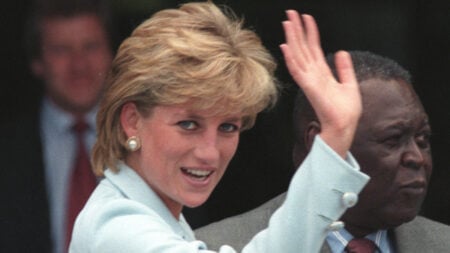 Photo of the late Princess Diana waving at corowd.