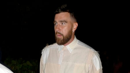 Travis Kelce is seen leaving Carbone beach tent wearing a bizarre patch outfit after attending Miami F1 Grand Prix without Taylor Swift