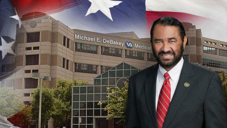 U.S. Representative Al Green poses in front of an American flag