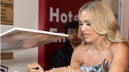 Carrie Underwood signing autographs.