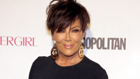 Kris Jenner poses on the red carpet.