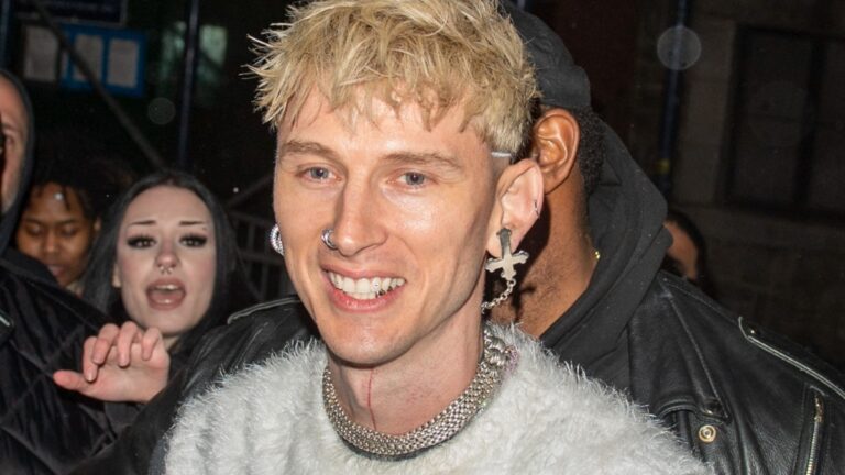 Machine Gun Kelly greets fans