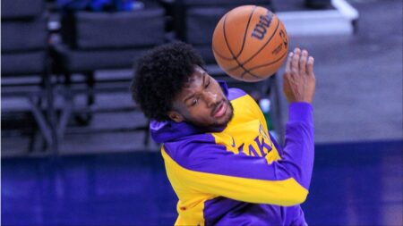 Bronny James gets hit with a basketball while warming up