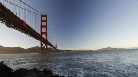 The Golden Gate Bridge in California, as seen from the shore below