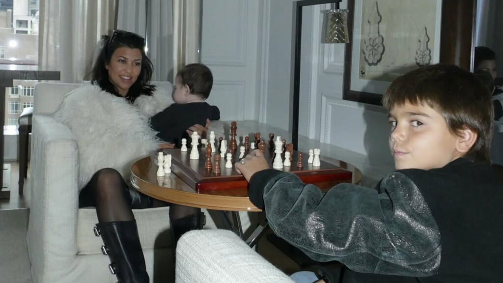 Kourtney Kardashian hanging out and with her sons