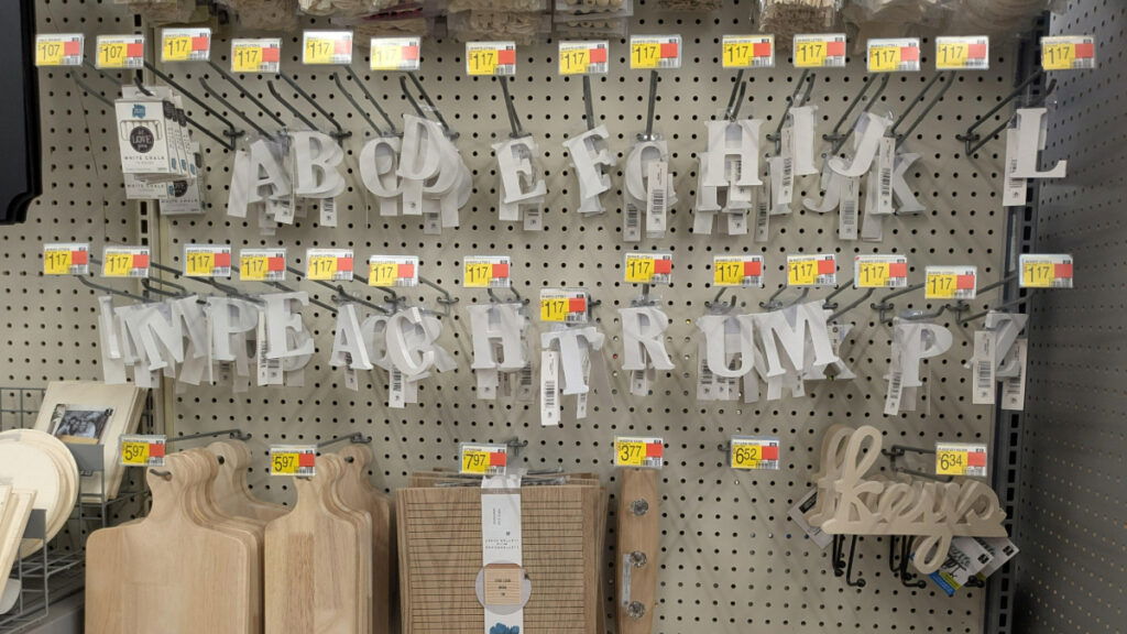 A disply of decorative letters rearranged to spell out "Impeach Trump" in a Walmart in Oxford Maine