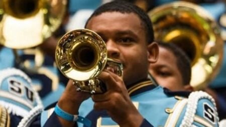 Caleb Wilson playing trumpet with the Human Jukebox