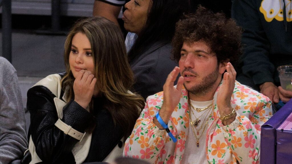 Selena Gomez and Benny Blanco attend the NBA game