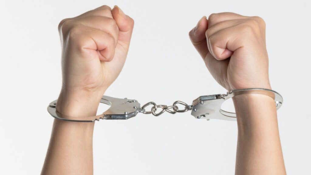 A person in handcuffs