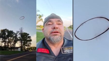 Motorcycle rider sees floating black ring