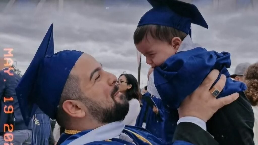 Graduate dad and baby in New York