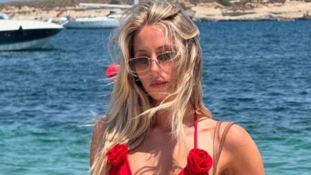 Alix Earle in red swimsuit
