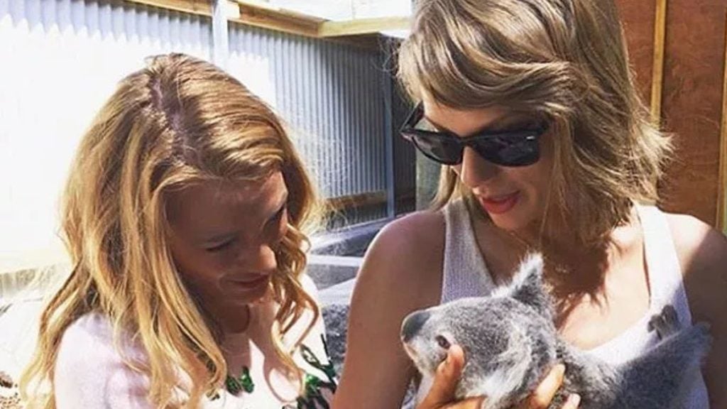 Blake Lively and Taylor Swift holding a koala