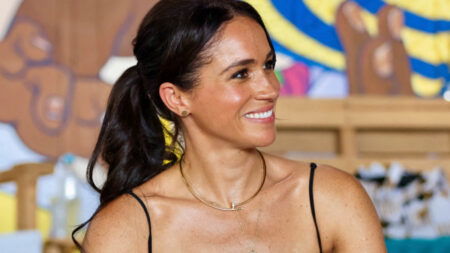 Meghan Markle in a striped dress during tour of Colombia.