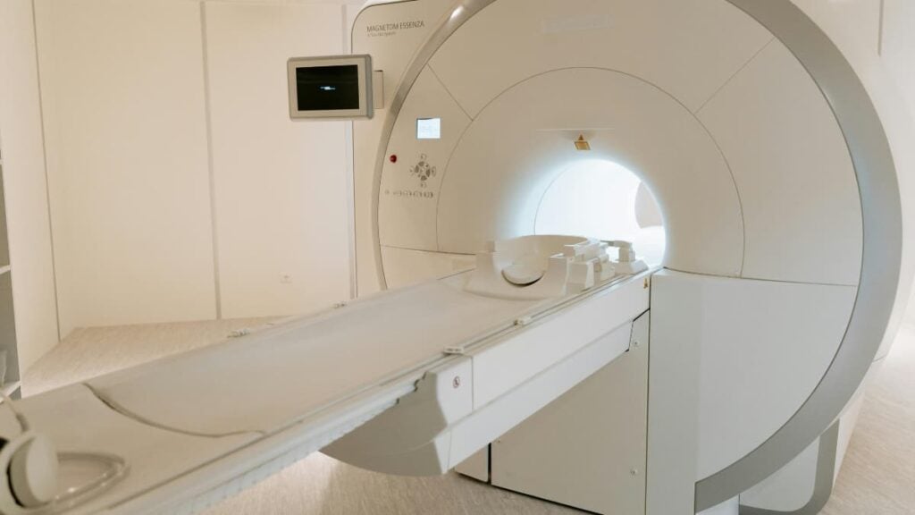A picture of an MRI machine in relation to the New York man.