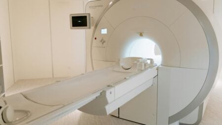 A picture of an MRI machine in relation to the New York man.