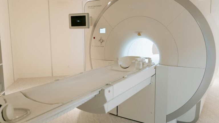 A picture of an MRI machine in relation to the New York man.