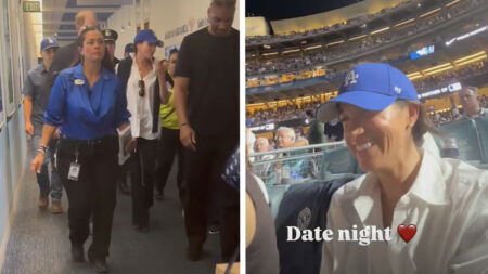 Police Escort Prince Harry and Meghan Markle Into Dodgers Stadium: ‘They Should Not Be Getting American Tax-Payed Security’ Prince Harry and Meghan Markle Surrounded by ‘Parade’ of Guards