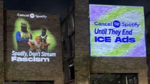 L.A. protestors project "cancel Spotify" ads on buildings